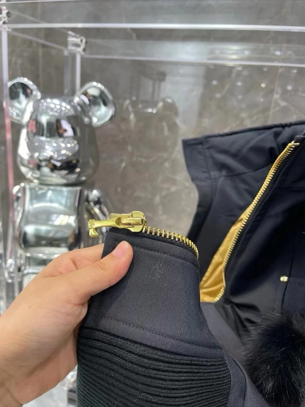 Moose Knuckles Black Hooded Puffer Jacket with Gold Lining
